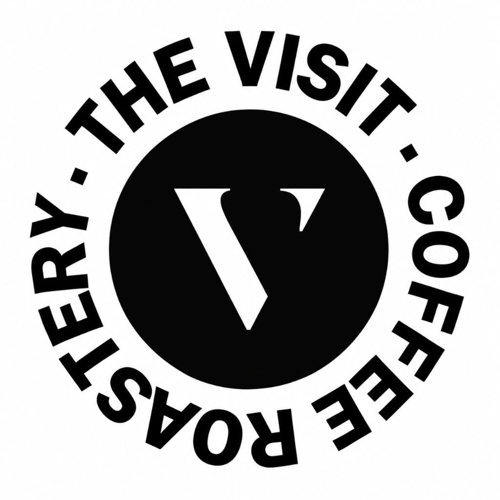 Logo von The Visit Coffee Roastery, schwarzer Kreis mit weißem V